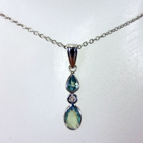 14 White Gold Pendant Set with a VS1 G Diamond and 2 Alexandrites